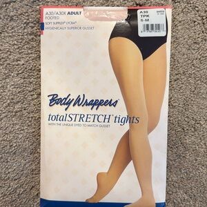Body Wrappers pink footed tights. Adult s/m